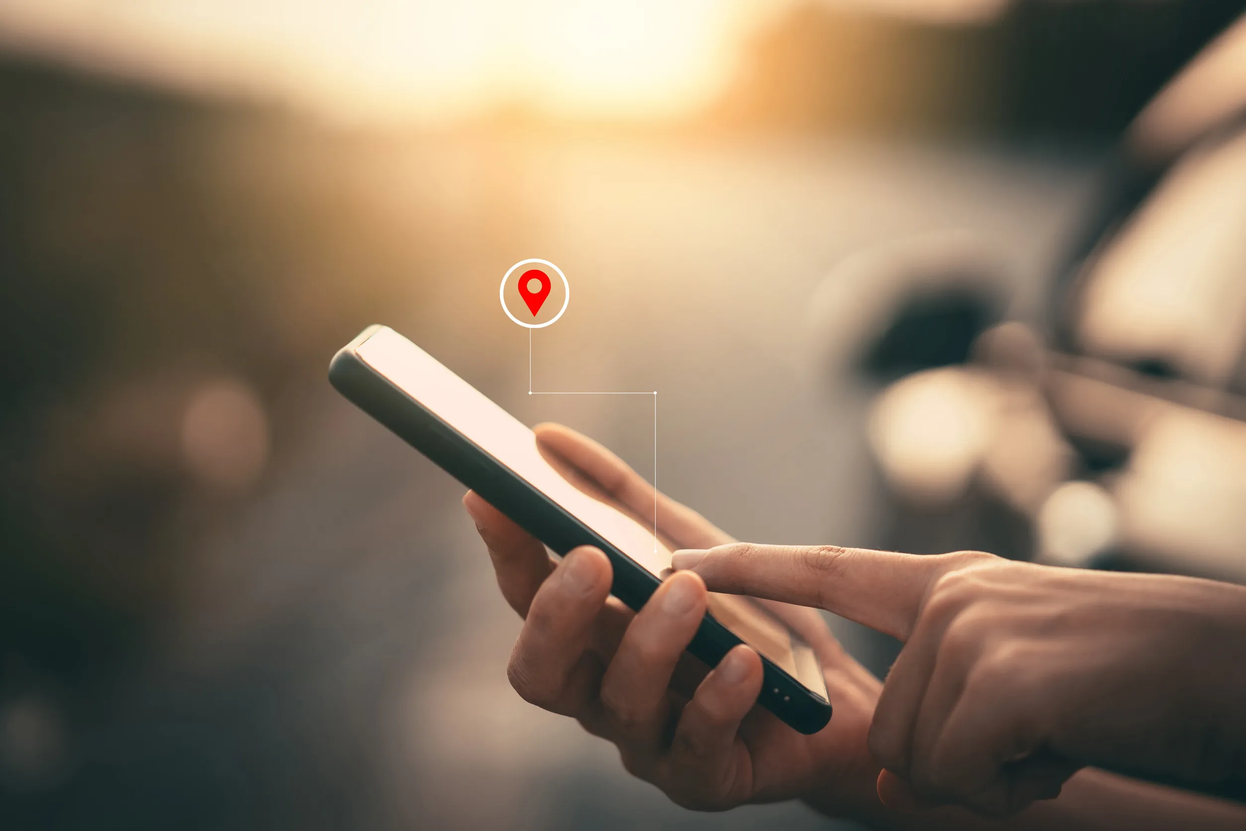 Woman hand using smart phone with navigator location point at street background
